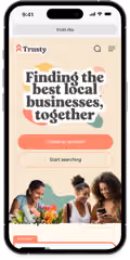 Mobile screen showing Trusty website with text 'Finding the best local businesses, together,' buttons for creating an account and starting search, and three smiling women holding flowers and a phone.